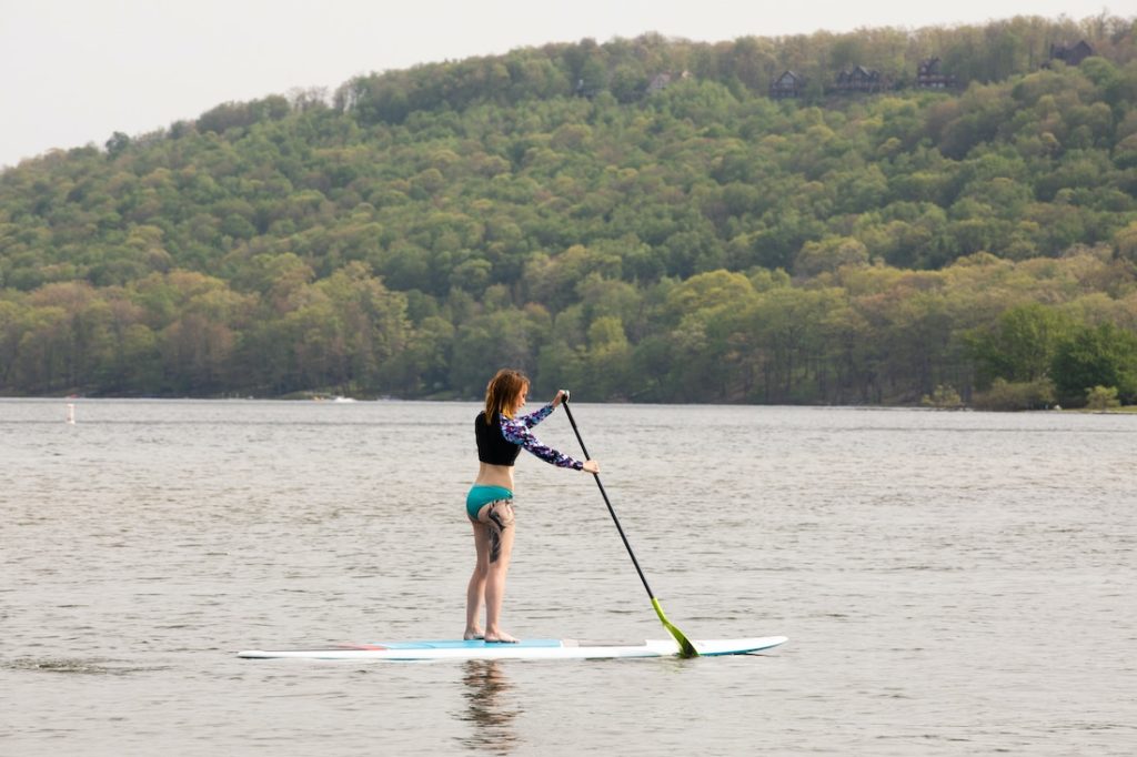 Things to do in Deep Creek, stand up paddle boarder on the lake